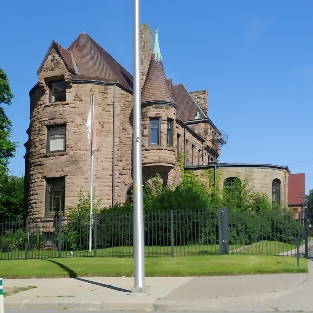 Older light brown house.