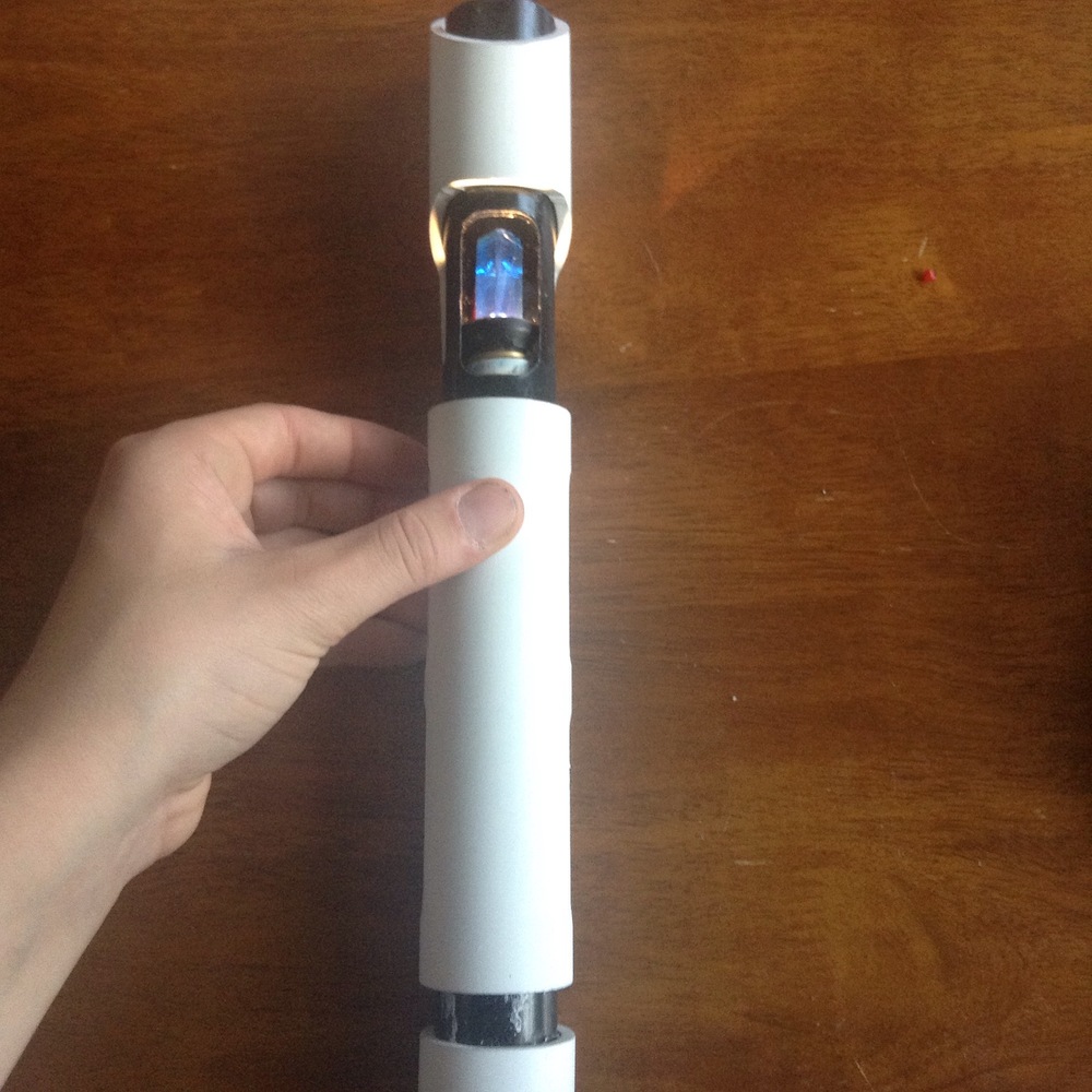 Finished lightsaber after paint with light on.