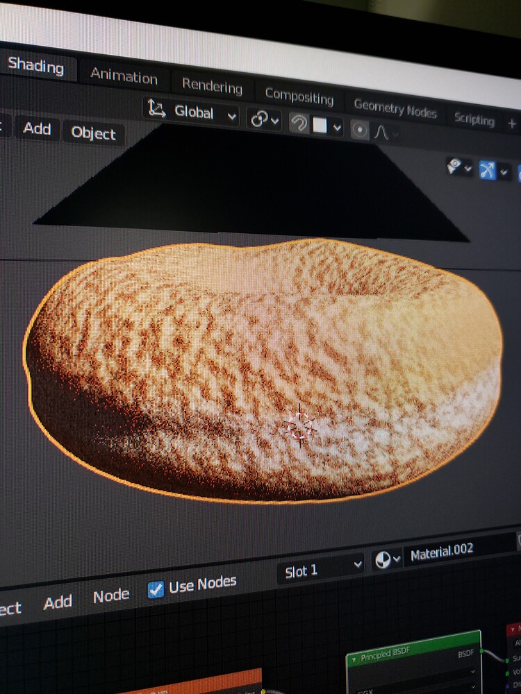 Shot of initial texture application on donut. Very bumpy texture.