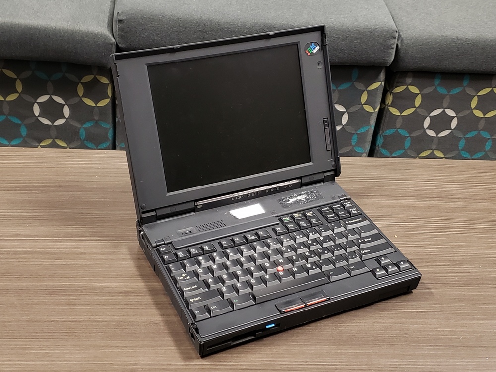 ThinkPad 755CX open on table.